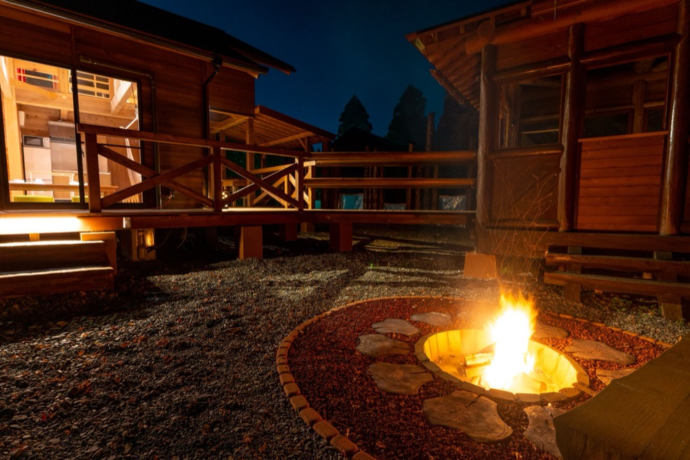 Private fire circle at dusk